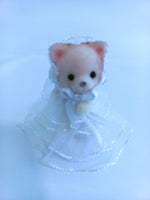 Baby sylvanian figurine.Baby girl dress all in white,with three layers of organza lace.A cute all white matching bonnet.